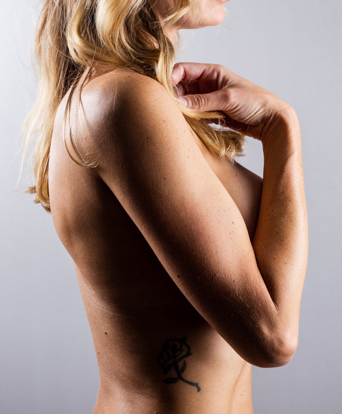 Boca Raton breast augmentation model with blonde hair